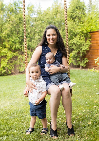 Owner and designer, Laura Malaquias, with her two sons. 
